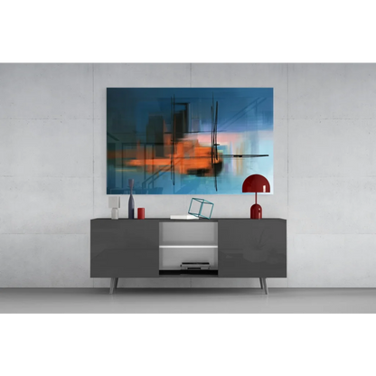 Abstract glass wall art with bold blue, orange hues and black geometric lines