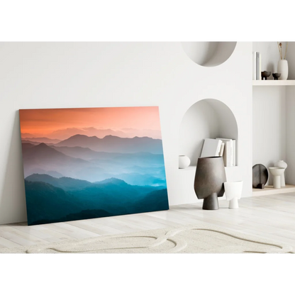 Stunning mountain sunset glass wall art with gradient orange to blue hues