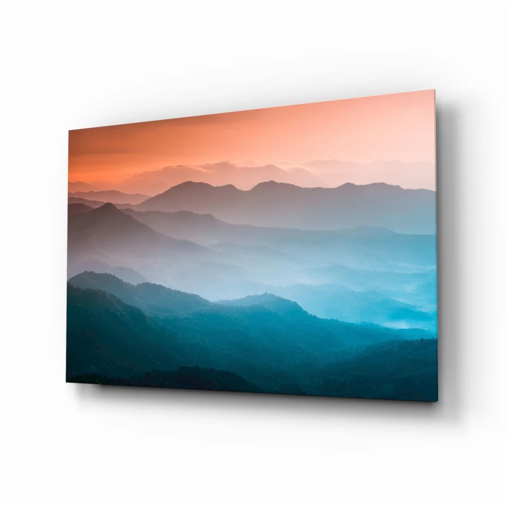 Stunning mountain sunset glass wall art print with serene peaks