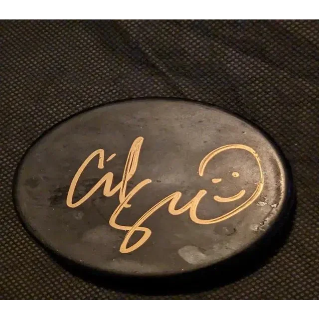 Adam Sandler auto signed hockey puck with smiley face and gold signature collectible