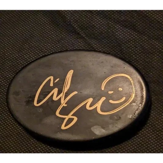 Adam Sandler auto signed hockey puck with smiley face and gold signature collectible