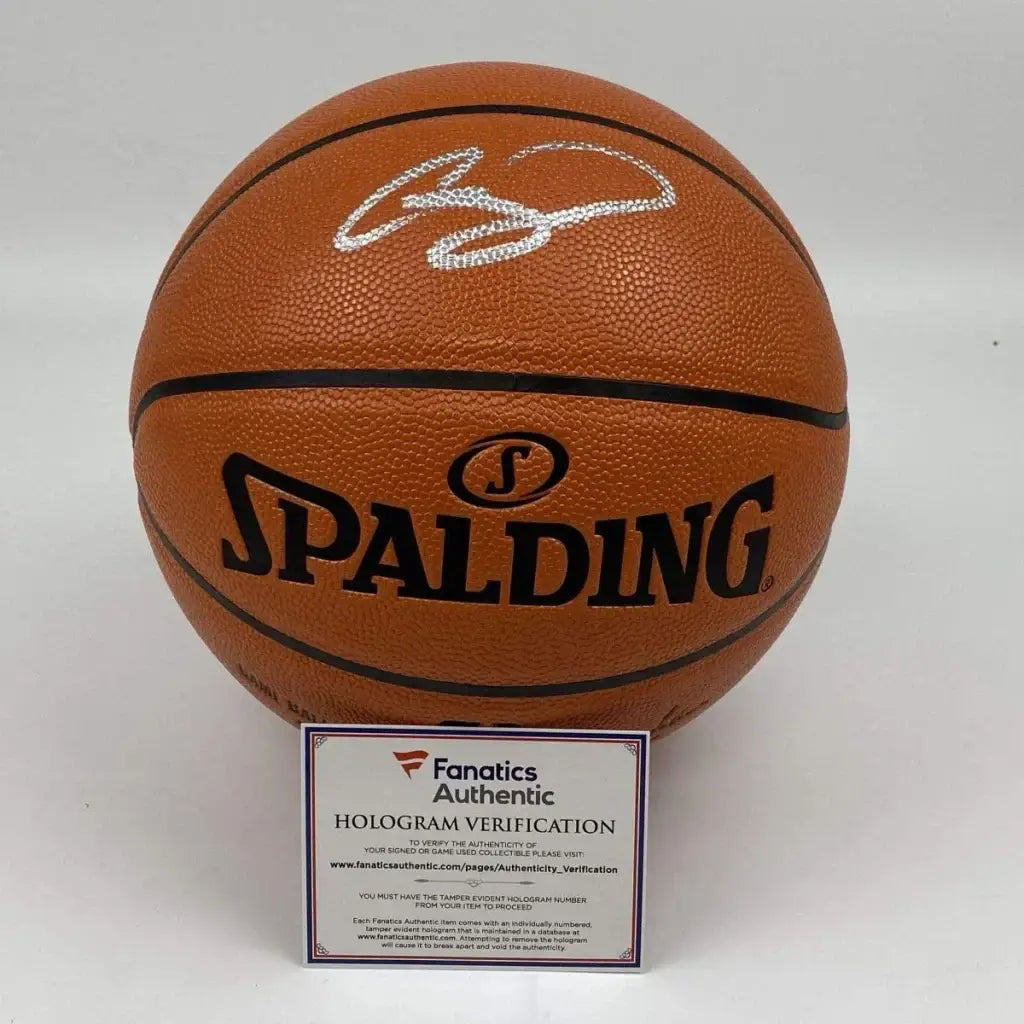Orange Spalding basketball with Adam Silver autographed signature