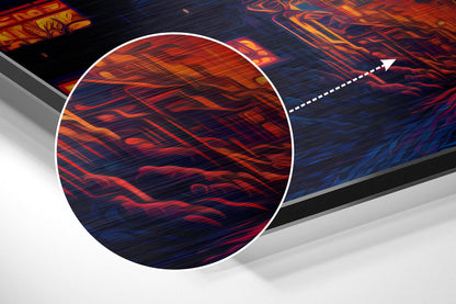 Close-up detail of brushed aluminum wall art showing red and orange diagonal brushstrokes with blue undertones and metallic finish.