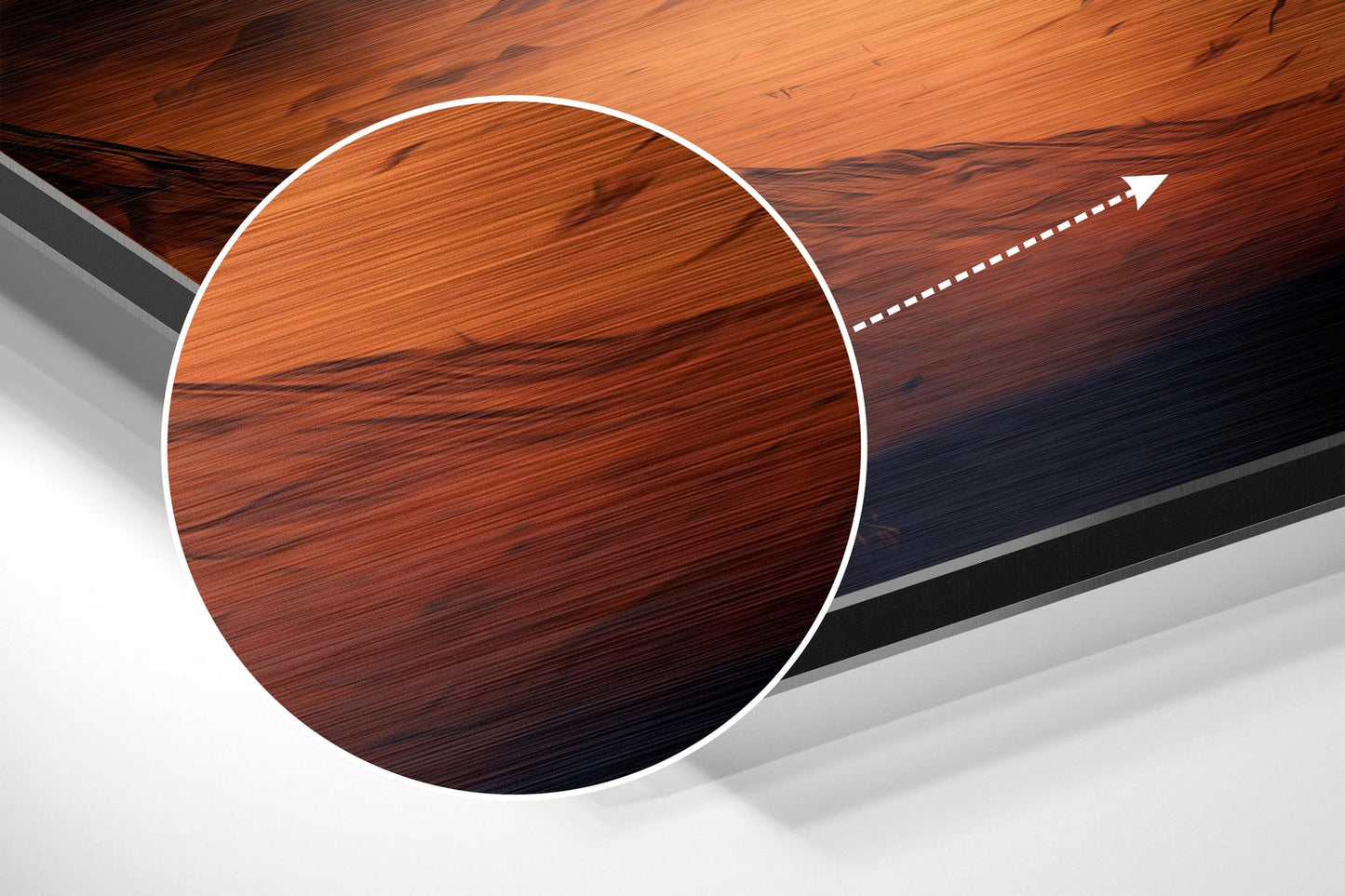Angled close-up view of brushed aluminum Dibond wall art showing wood grain texture in warm orange and dark brown tones with directional arrow.