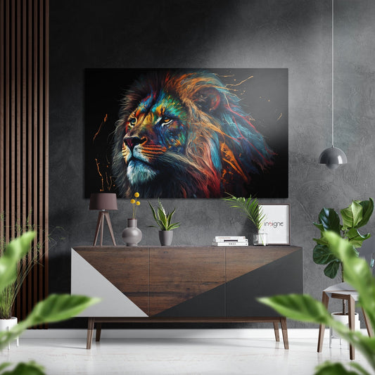 Colorful lion profile wall art displayed above wooden dresser in modern gray interior with plants and pendant lamp.