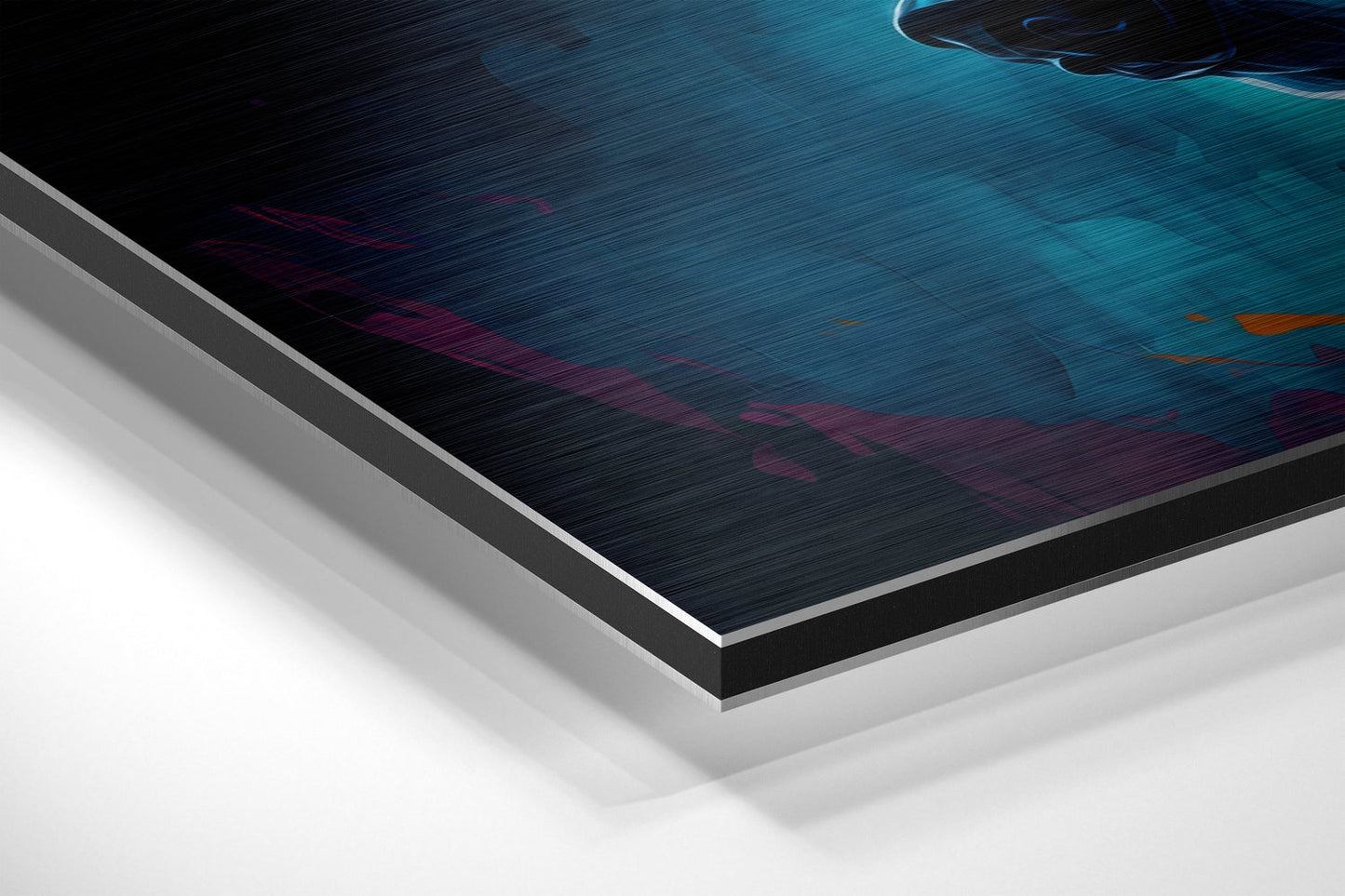 Close-up angled view of brushed aluminum dibond layers showing teal, dark blue, and burgundy abstract printed design with silver edge detail.