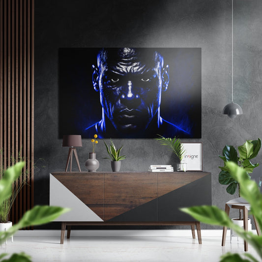 Modern living room interior featuring blue-lit boxer portrait above wooden console table with potted plants and pendant lamp.