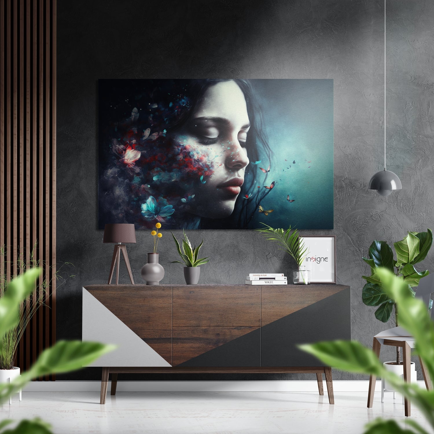 Modern interior with brushed aluminum wall art featuring woman's profile with colorful floral and butterfly dispersal effect.