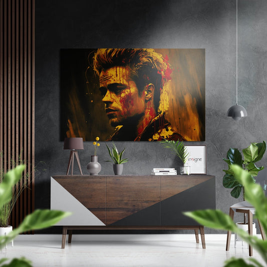 Contemporary interior displaying gold and red portrait artwork on gray wall above wooden credenza with plants and accessories.