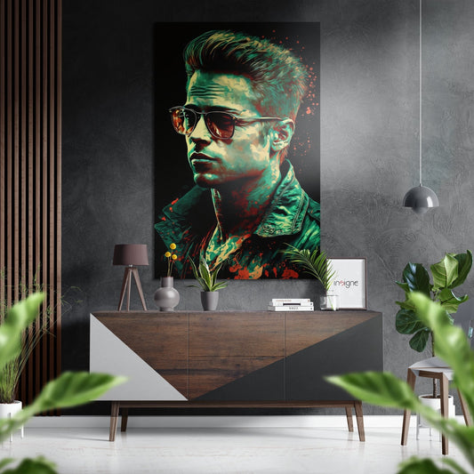 Modern interior with vibrant green and red portrait artwork hanging above wooden console table with décor and plants.