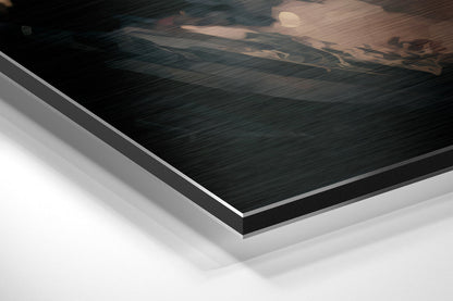 Close-up angled view of layered Dibond panel showing brushed black aluminum surface with white backing material visible at edge.