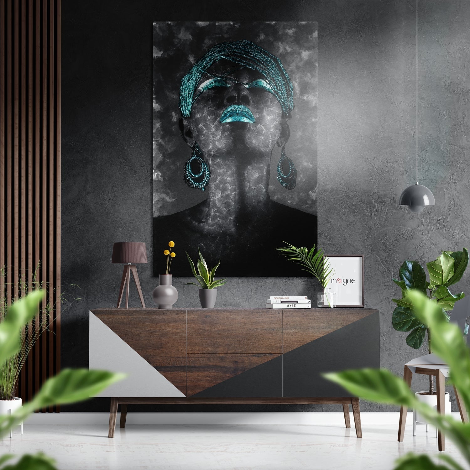 Modern interior scene featuring black and turquoise portrait artwork displayed above wooden credenza with potted plants and decorative accessories.