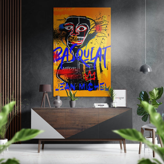 Vibrant pop art skull painting displayed above a wooden console table in a modern interior setting with plants and pendant lighting.