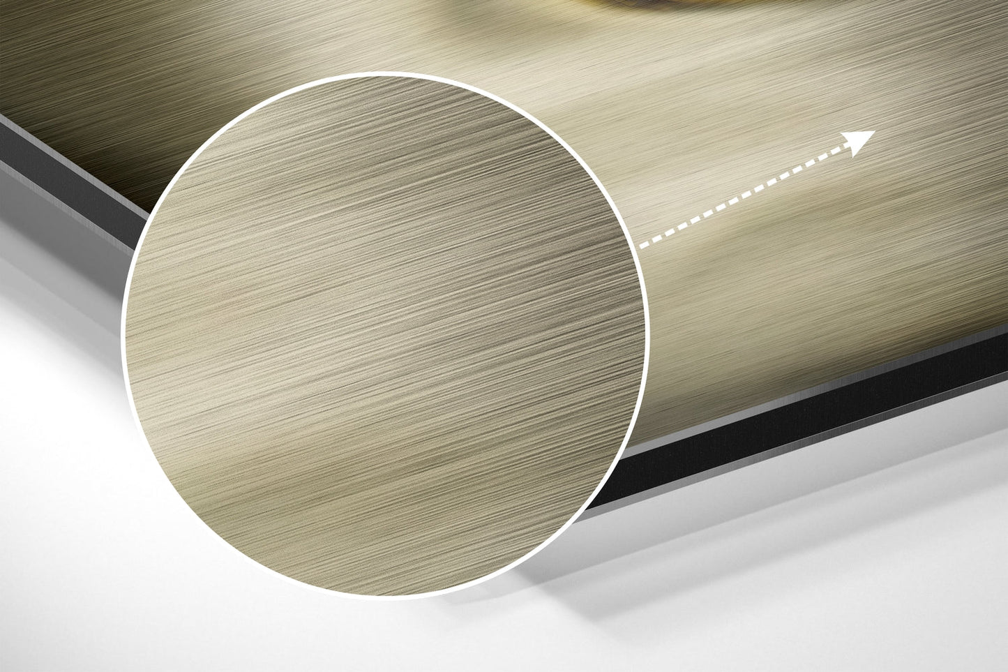 Close-up angled view of brushed aluminum Dibond sheet showing circular cross-section with linear texture and directional arrow indicator.