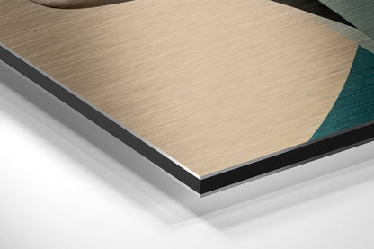 Close-up angled view of layered Dibond panel showing brushed aluminum top surface with black edge trim and white backing layer.