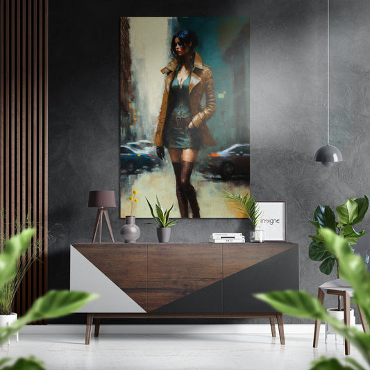 Modern interior display featuring a brushed aluminum wall art depicting a woman in a brown coat and dark dress standing on an urban street, mounted above a wooden console table with plants and decor.
