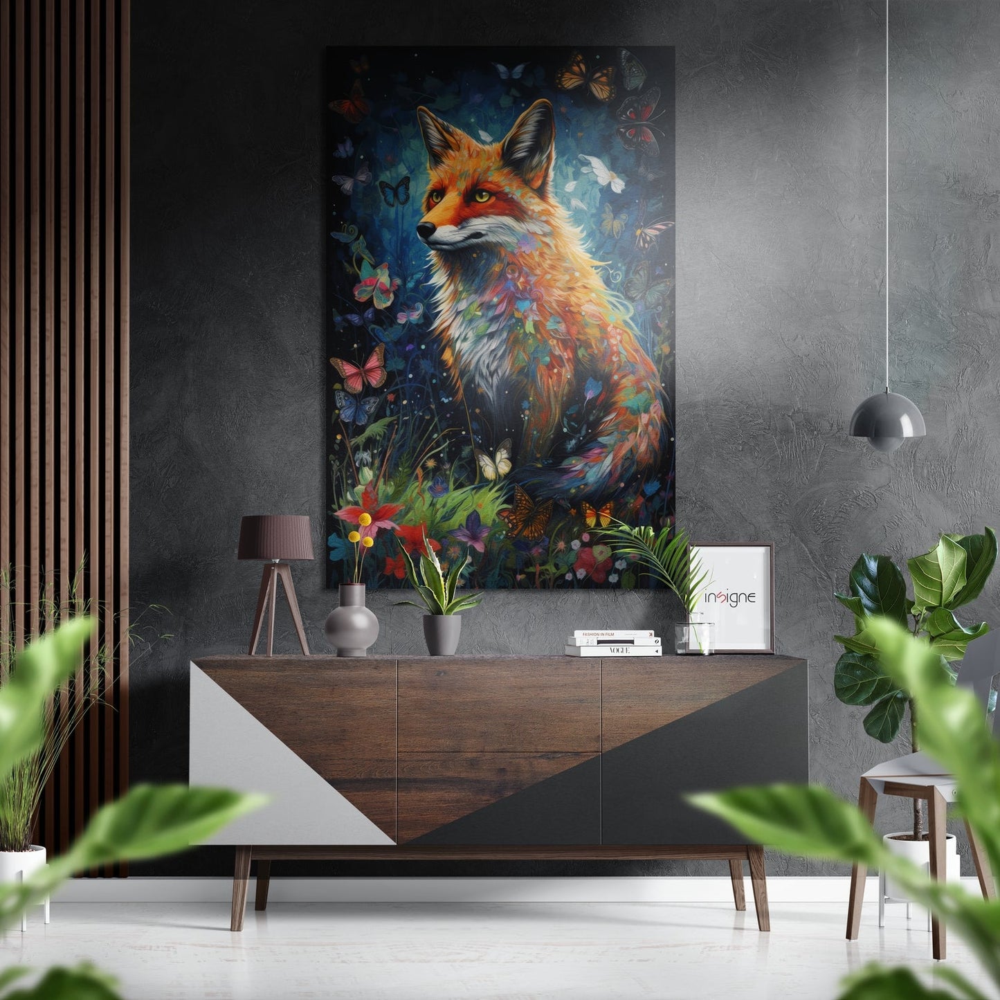 Colorful fox artwork with butterflies and flowers displayed above wooden dresser in modern gray interior with plants and pendant light.