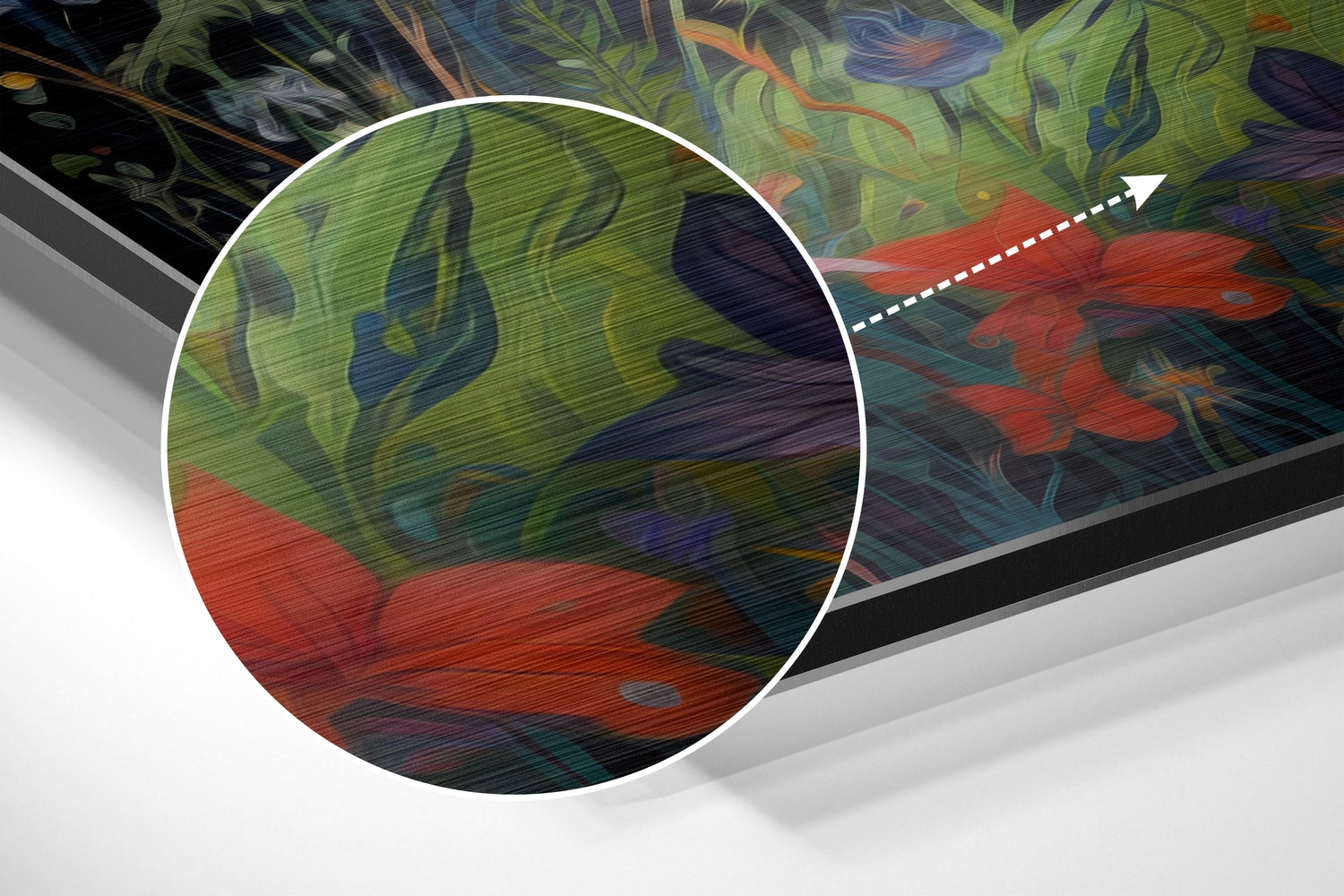 Close-up detail of brushed aluminum surface showing vibrant abstract fox artwork in green, red, and blue tones with visible horizontal texture lines.
