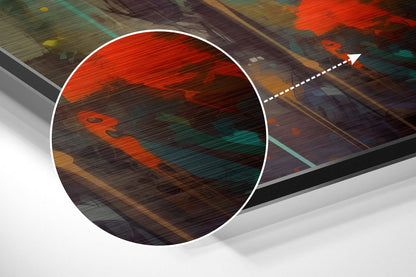 Close-up detail of brushed aluminum surface with red and teal abstract robot design and directional arrow overlay.
