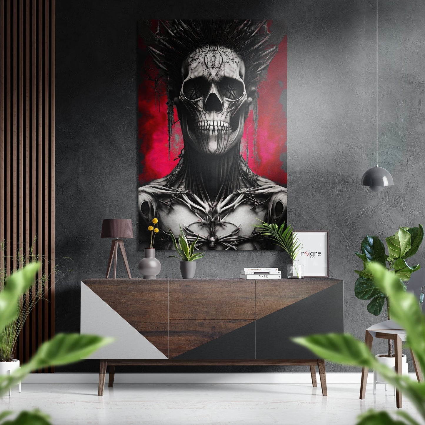 Skull artwork with black and white portrait and red background mounted above wooden console table in modern interior setting.