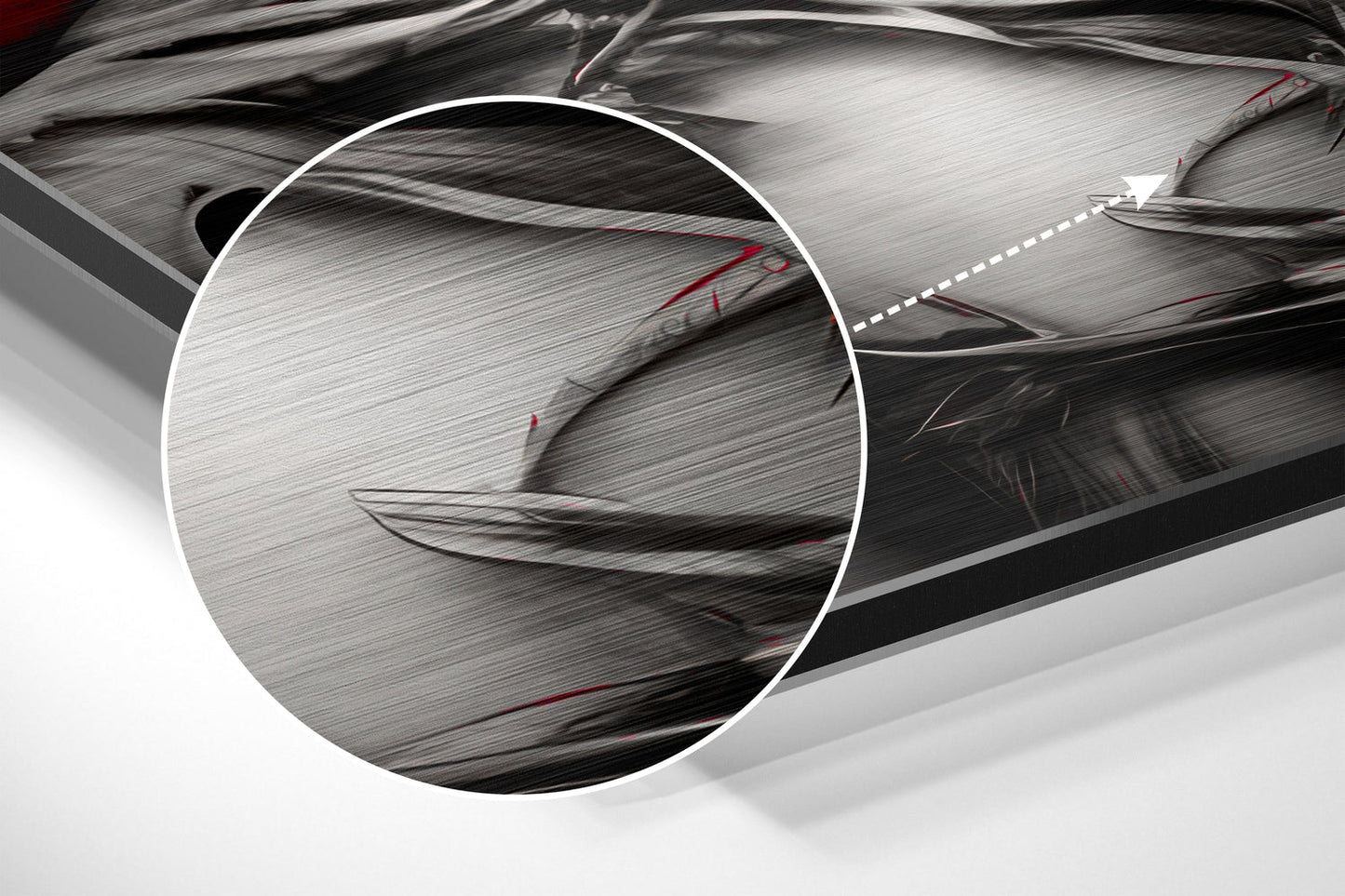 Close-up detail of brushed aluminum surface with red accents and linear texture patterns under magnification.