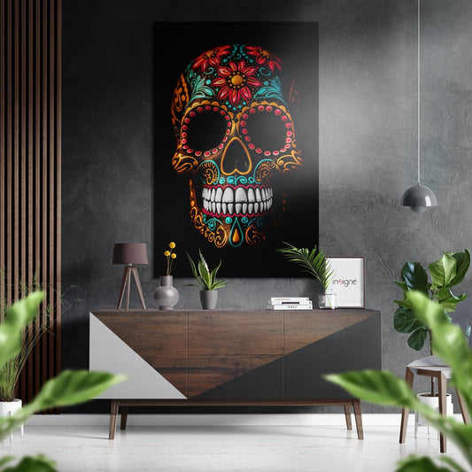 Colorful sugar skull wall art with red, gold, and turquoise floral patterns displayed above a wooden console table in modern interior setting.