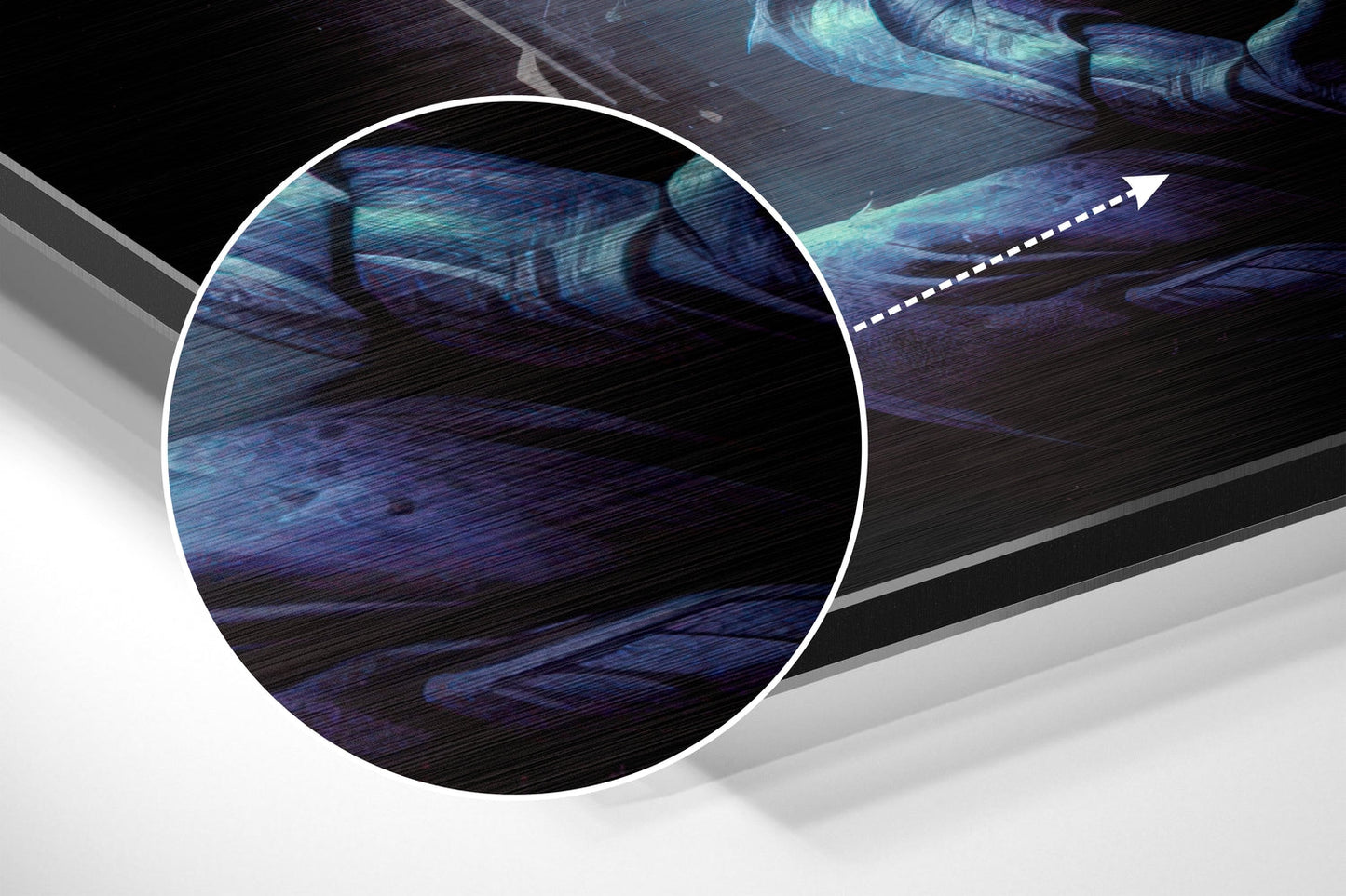 Close-up detail of brushed aluminum surface showing blue and teal streaked texture with directional arrow indicator.