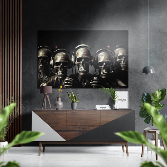 Modern interior with brushed aluminum wall art depicting five skulls wearing headphones displayed above a wooden console table with decorative objects.