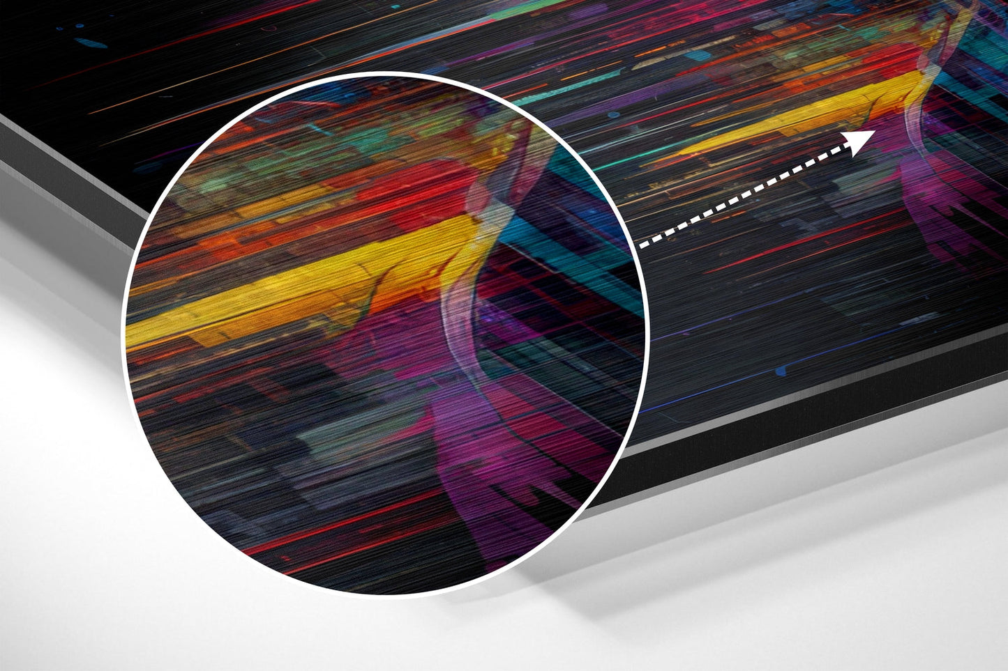 Close-up detail of brushed aluminum wall art showing vibrant horizontal streaks of red, yellow, blue, and purple with motion blur effect and directional arrow overlay.