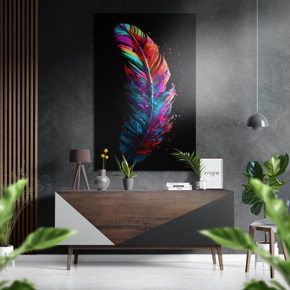Vibrant multicolored feather with blue, pink, and orange hues displayed on black aluminum panel above wooden dresser in modern interior.