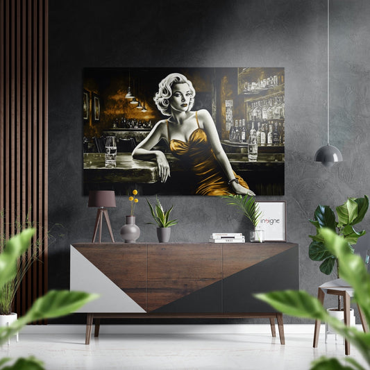Styled interior scene featuring Amber Gown Woman at Bar brushed aluminum wall art displayed above wooden console table with decorative accessories.