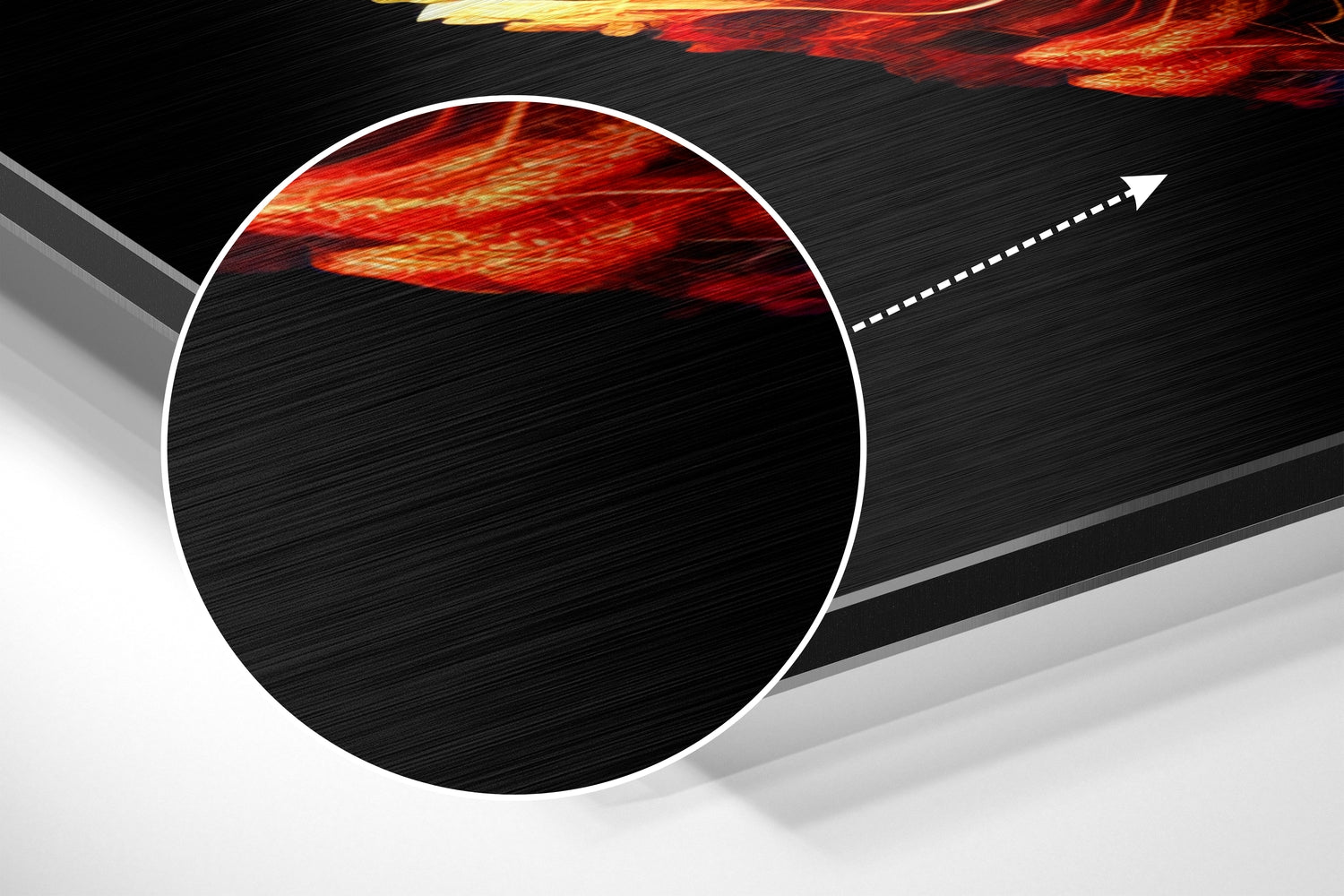 Abstract 3D composition featuring a white-bordered black circle with red and gold flame-like design elements against brushed metal surfaces and directional arrow.