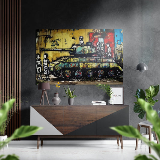 Street art depicting two children watching a tank with yellow background, displayed on gray wall above wooden dresser in modern interior setting.