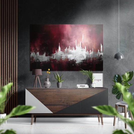 Modern interior with Crimson Sky City Skyline aluminum art displaying red and white cityscape above wooden console table with plants and décor.