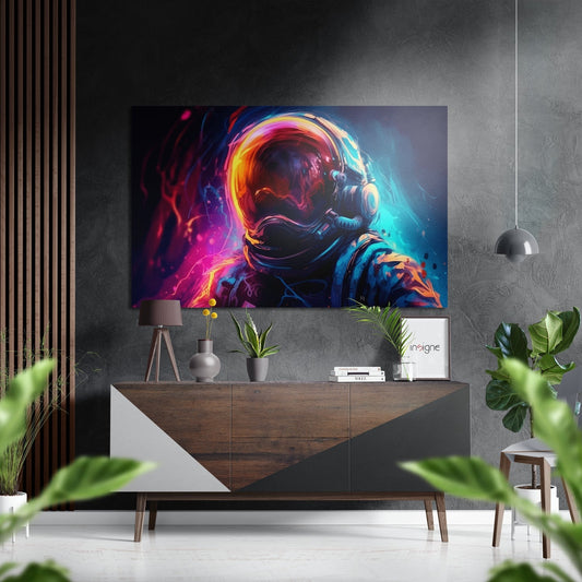 Neon-glowing astronaut helmet artwork displayed above a wooden console table in a modern living room setting with plants and decor.
