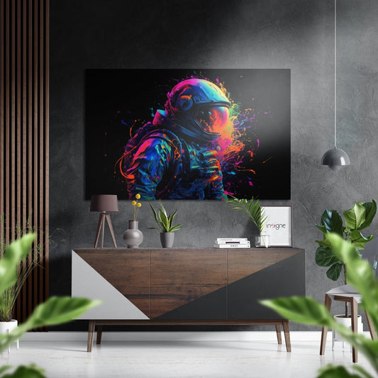 Modern living room with colorful neon astronaut artwork displayed above wooden credenza with plants and decor.