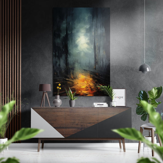 Modern interior showroom displaying Darkness Brushed Aluminum Dibond wall art with moody blue-gray tones and golden flames above a wooden console.