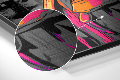 Close-up detail of brushed aluminum wall art showing magnified section with magenta, orange, and purple abstract brushstrokes on textured gray surface.