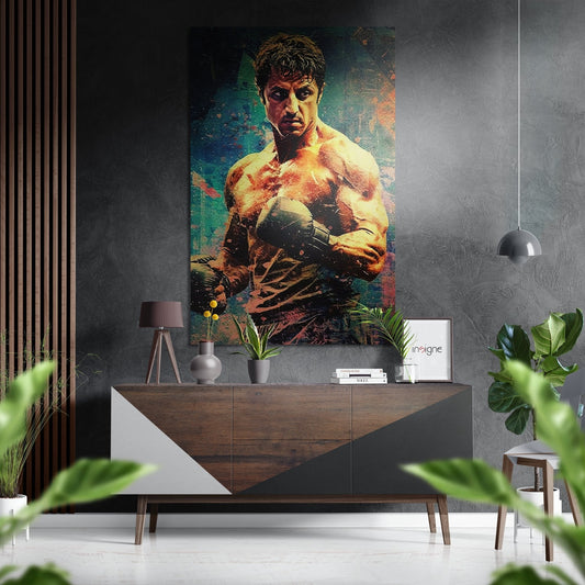 Teal grunge boxer portrait with warm orange and green tones displayed above wooden dresser in modern interior setting.