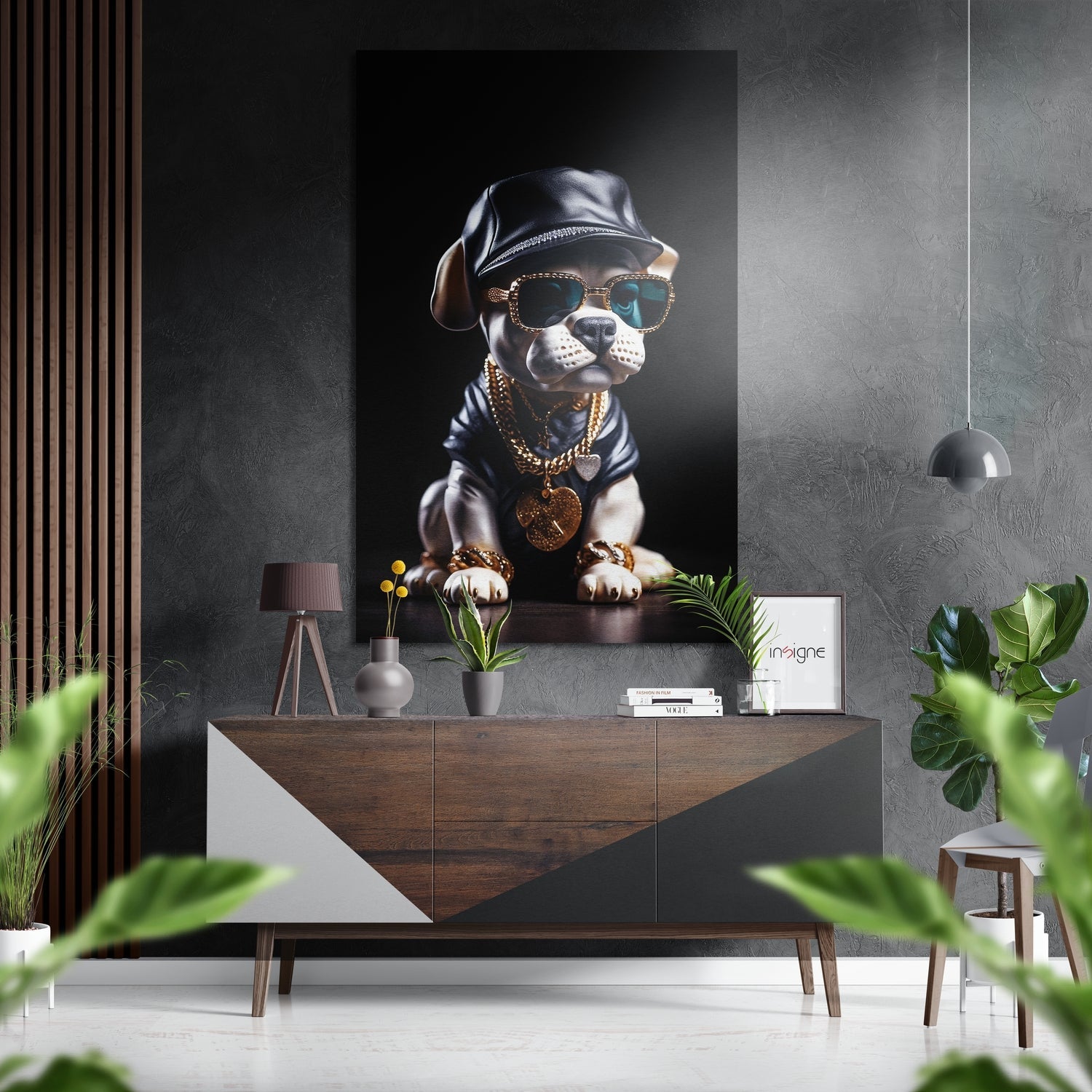 Stylized dog wearing sunglasses and chain necklace displayed on wall above wooden dresser in modern interior setting.