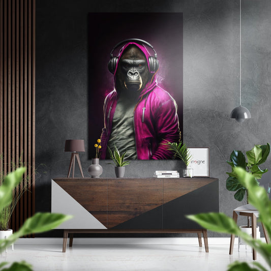Modern interior showroom displaying brushed aluminum wall art of a gorilla wearing magenta hoodie and headphones above wooden console.