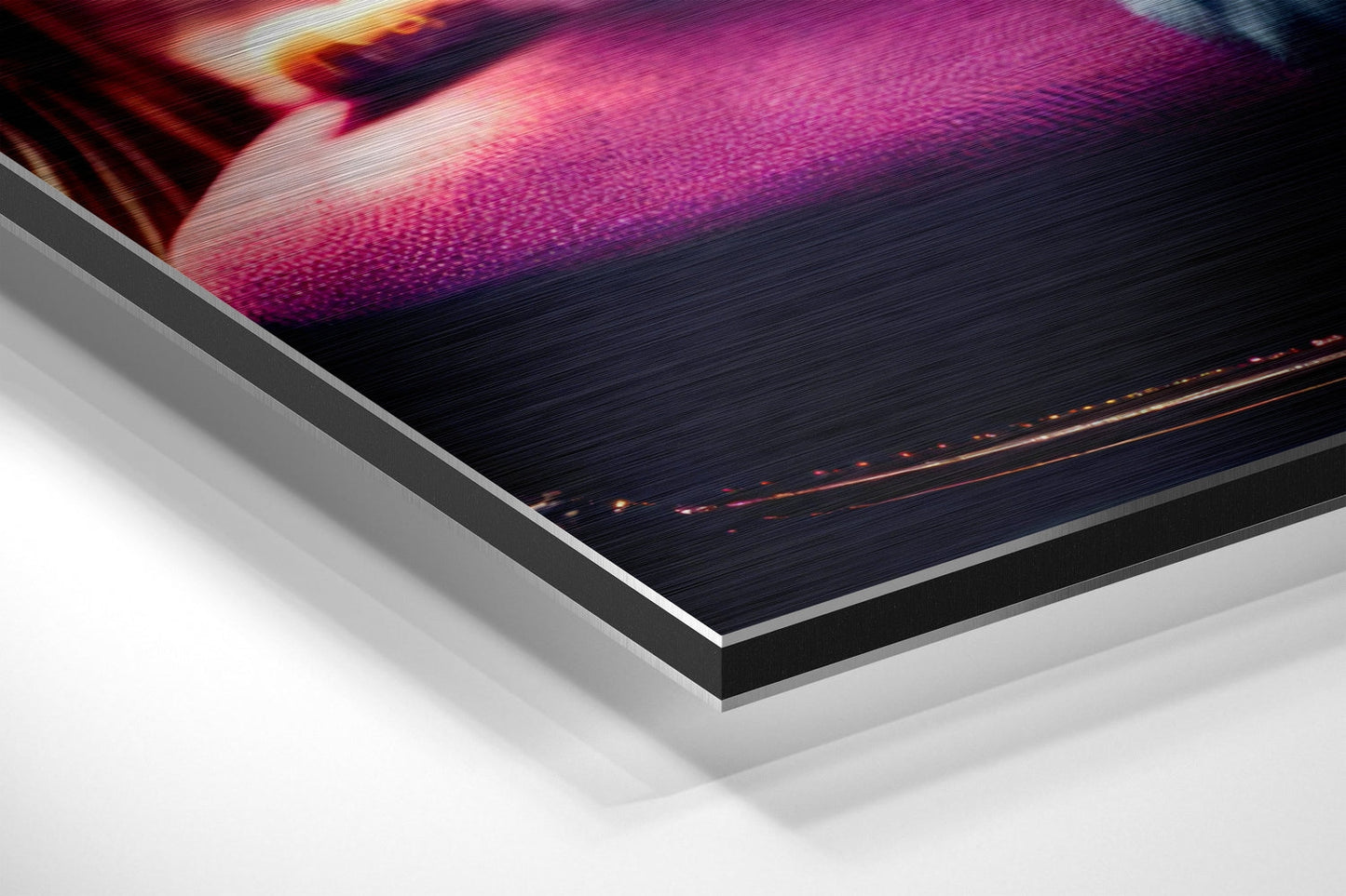 Close-up angled view of layered brushed aluminum and black Dibond panel showing edge construction and vibrant magenta artwork detail.