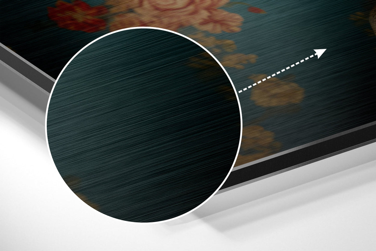Close-up angled view of brushed aluminum Dibond wall art featuring a white-bordered circular panel with teal and gold floral pattern, white dashed directional arrow.