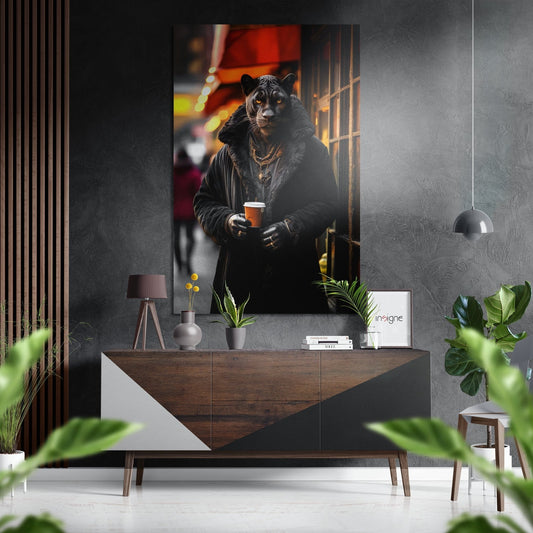 Brushed aluminum Dibond wall art depicting a panther in black clothing holding a beverage, displayed above a wooden console table in a modern interior.