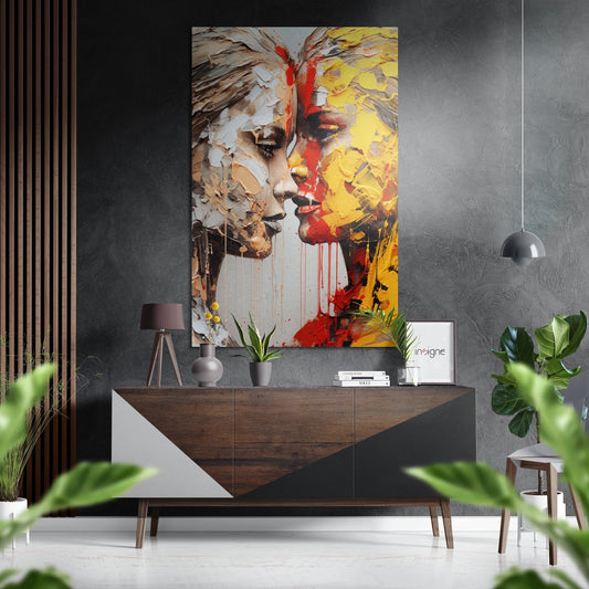 Modern interior display featuring abstract portrait wall art with white, red, and yellow tones mounted above wooden dresser.