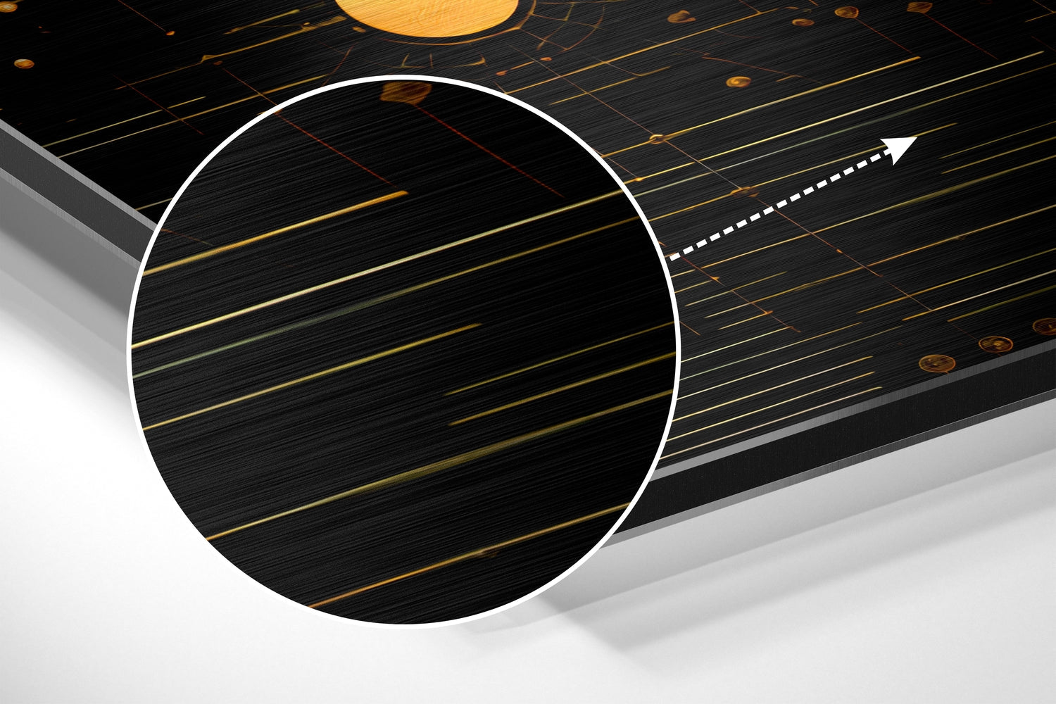 Close-up angled view of brushed aluminum wall art showing circular design with gold horizontal lines and white border outline.