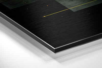 Layered angled view of brushed aluminum Dibond panels in black and white with gold accent lines against white background.