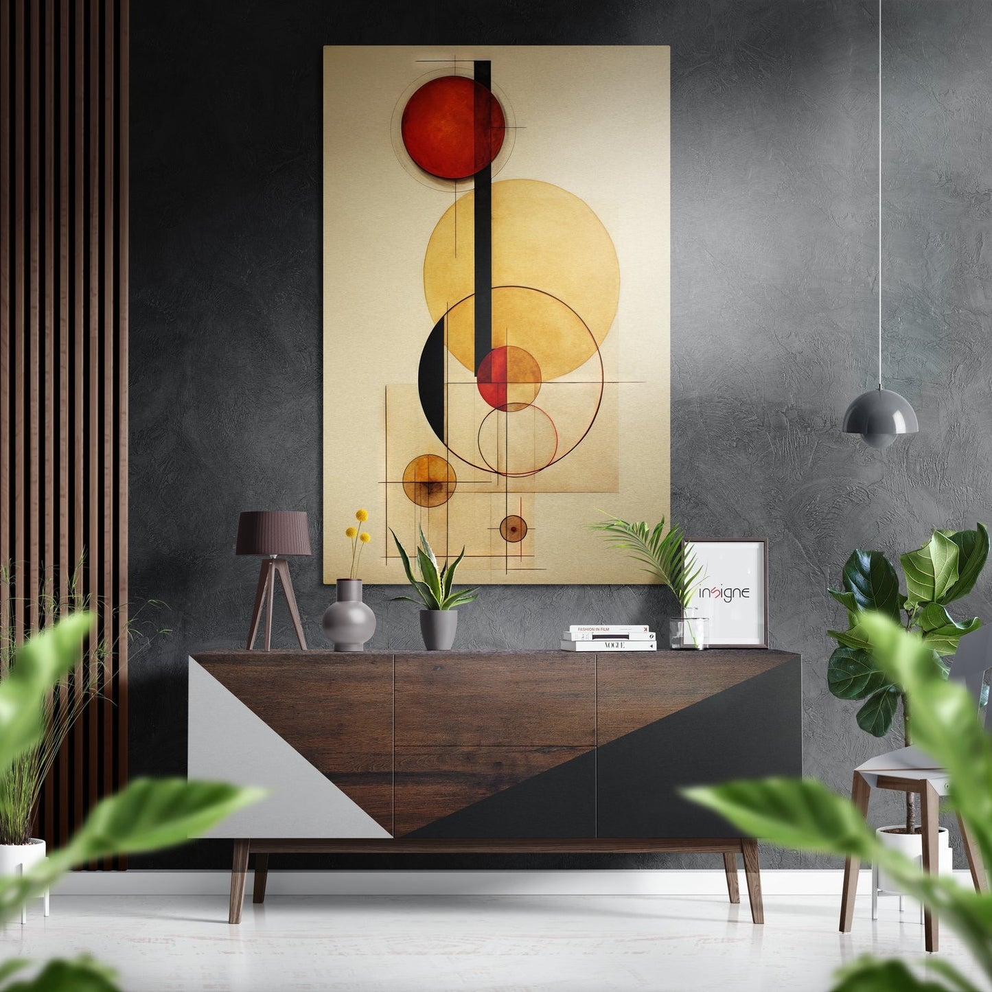 Modern geometric art featuring red, yellow, and black circles with vertical lines displayed above a wooden console table in a styled interior setting.