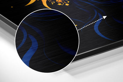 Abstract angled view of brushed aluminum wall art featuring blue flowing curves on black textured background with white border frame.