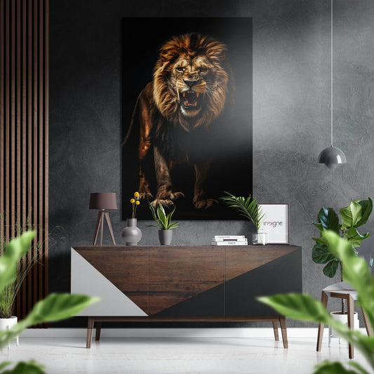 Roaring lion canvas displayed above wooden dresser in modern interior with plants, lamp, and decorative items.